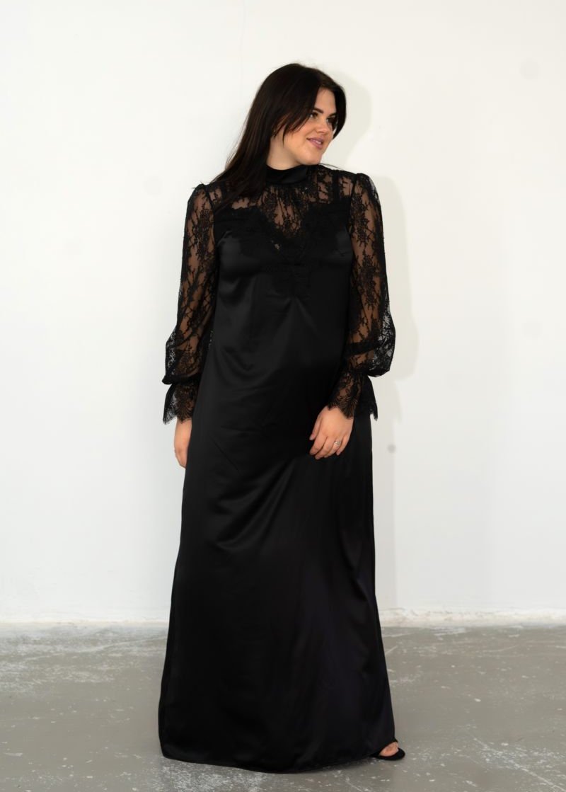 Black satin long dress with woodland details.