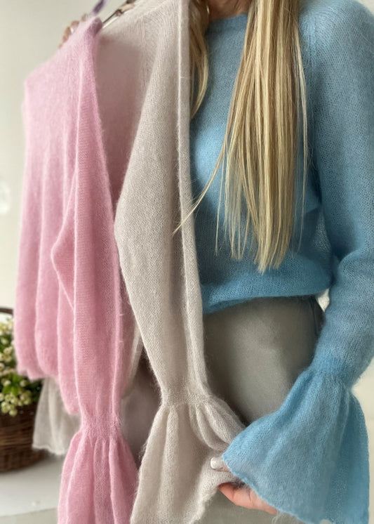 MOHĒRAS DŽEMPERIS MAIGS UN PŪKAINS