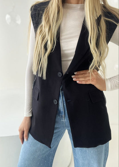 MELNA VESTE