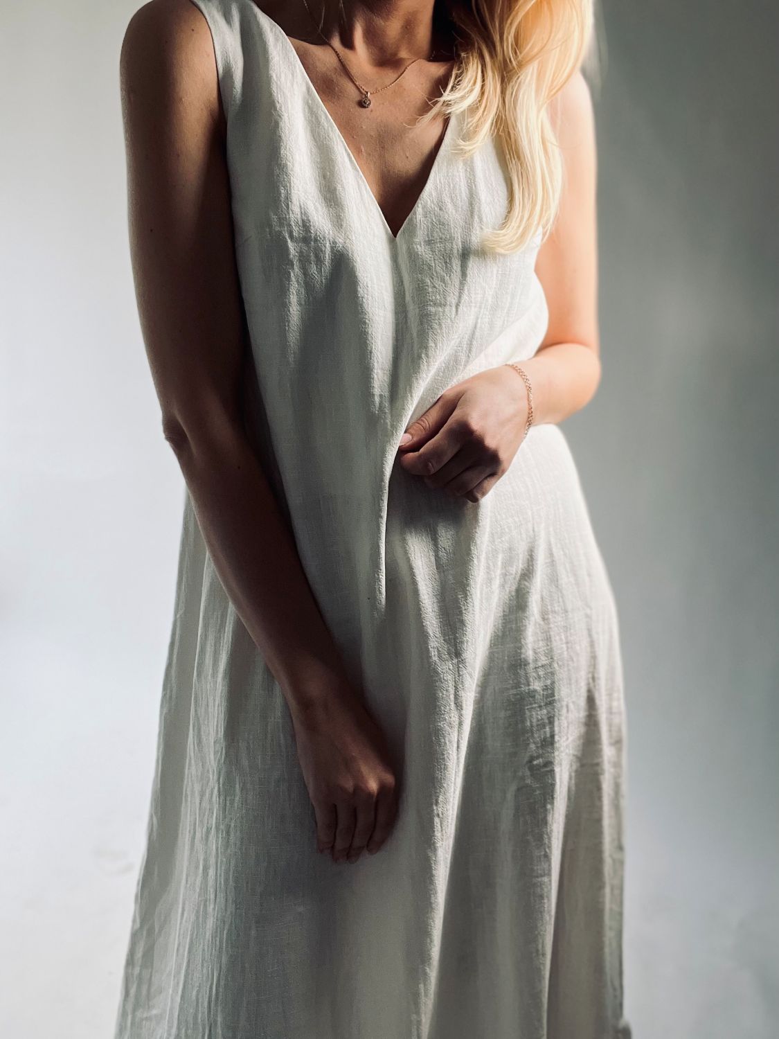 Linen dress. White linen dress. Long, white linen dress.